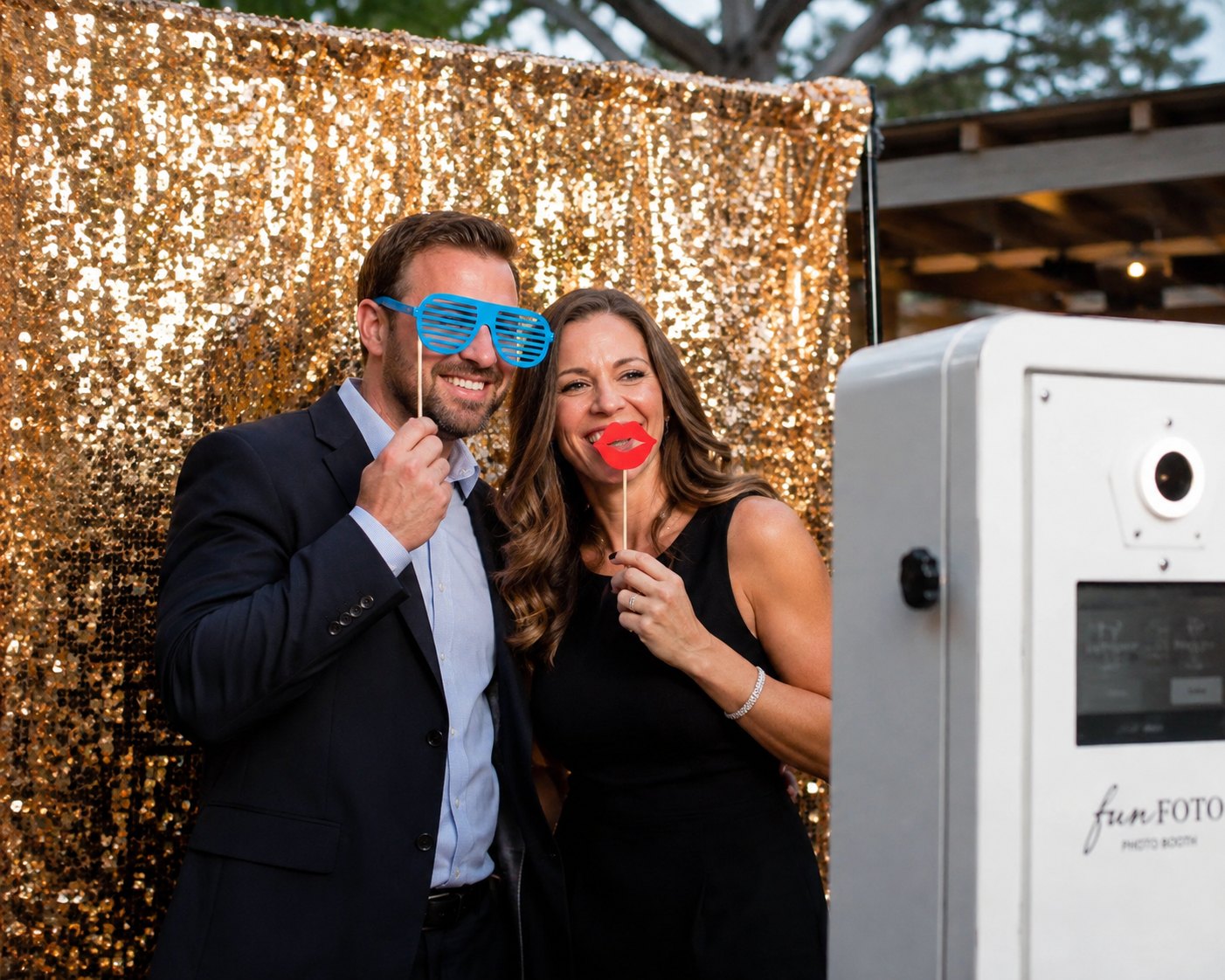 A couple getting their picture taken at a MusicMasters photo booth in Maryland