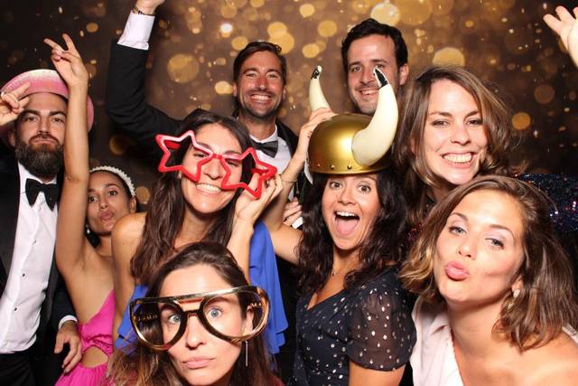 Guests posing in a MusicMasters photo booth
