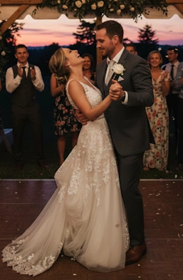 A couple sharing a dance at their reception