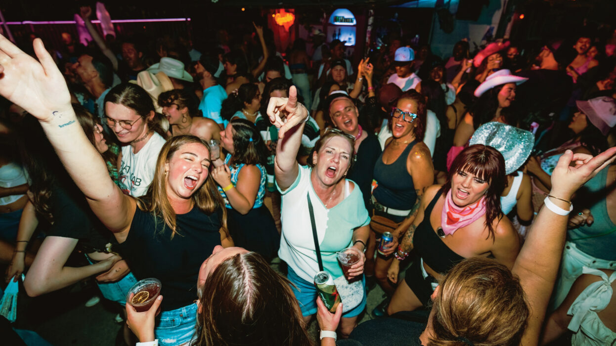 Packed dance floor at a MusicMasters event